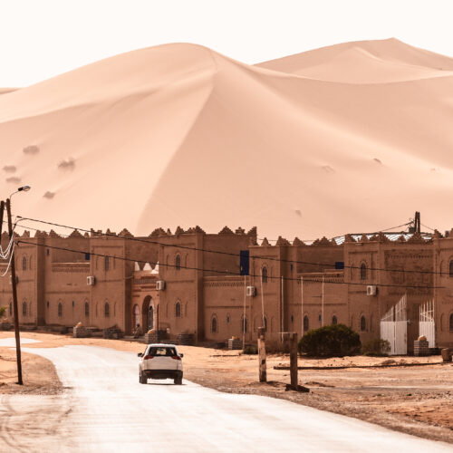 View of Merzouga and sand dunes, gateway to Sahara Desert, Merzouga, Morocco . High quality photo